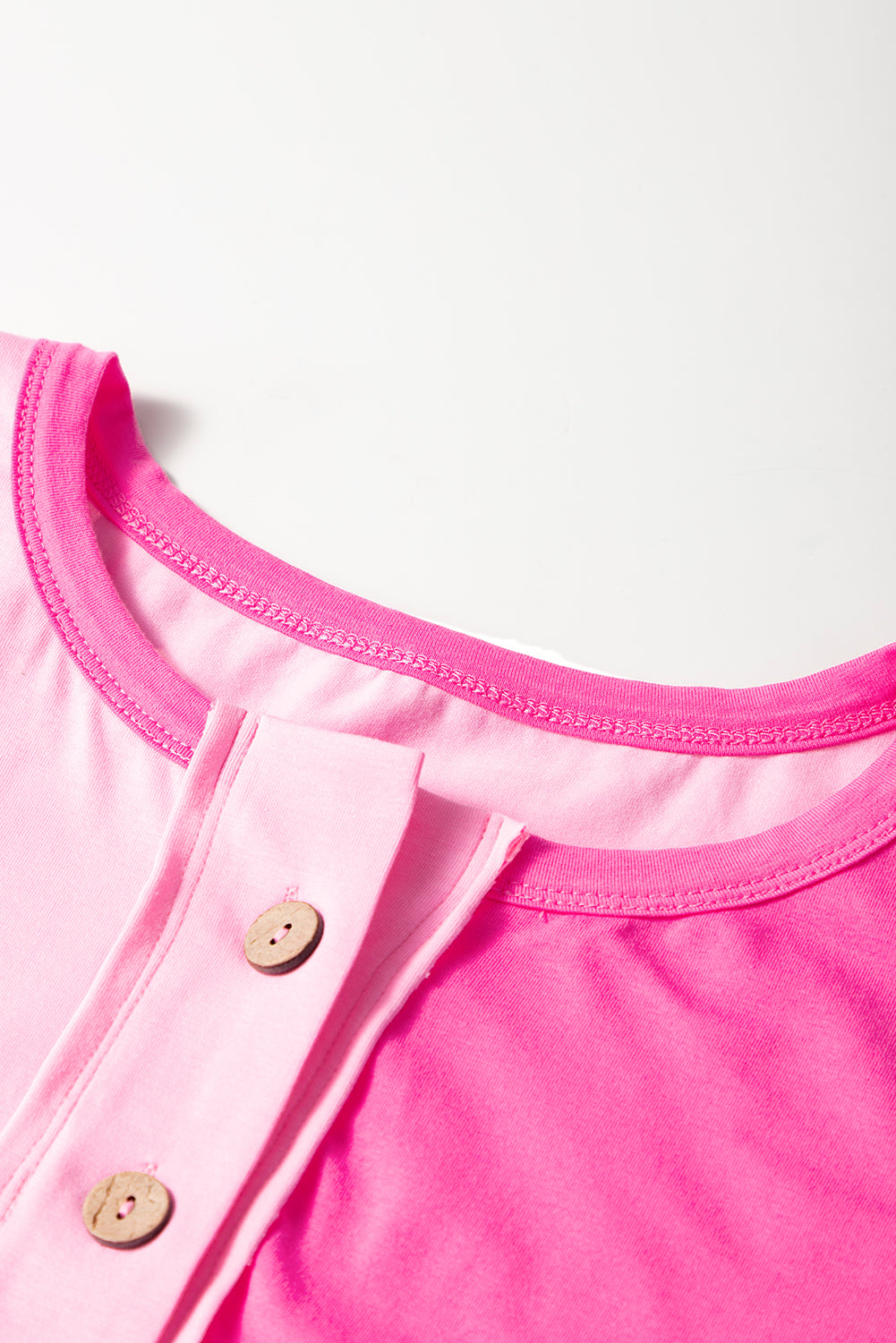 Bright pink short sleeve top for curvy women with button detail by kjplussizefashion