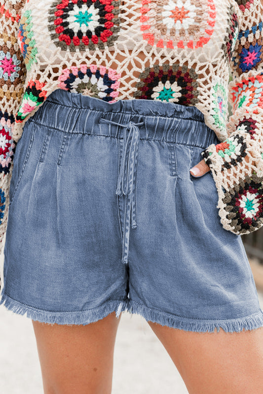 Comfortable plus size summer shorts in blue with drawstring waist and frayed hem detail