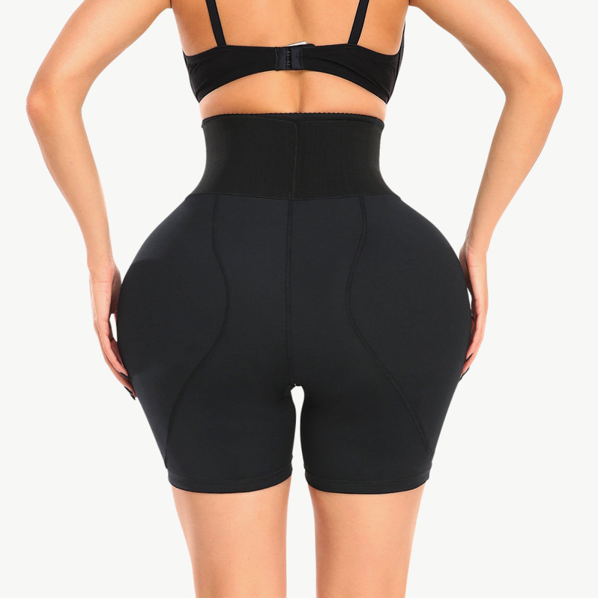 Trendsi full coverage padded shorts for women in black shown from the back with high waist design