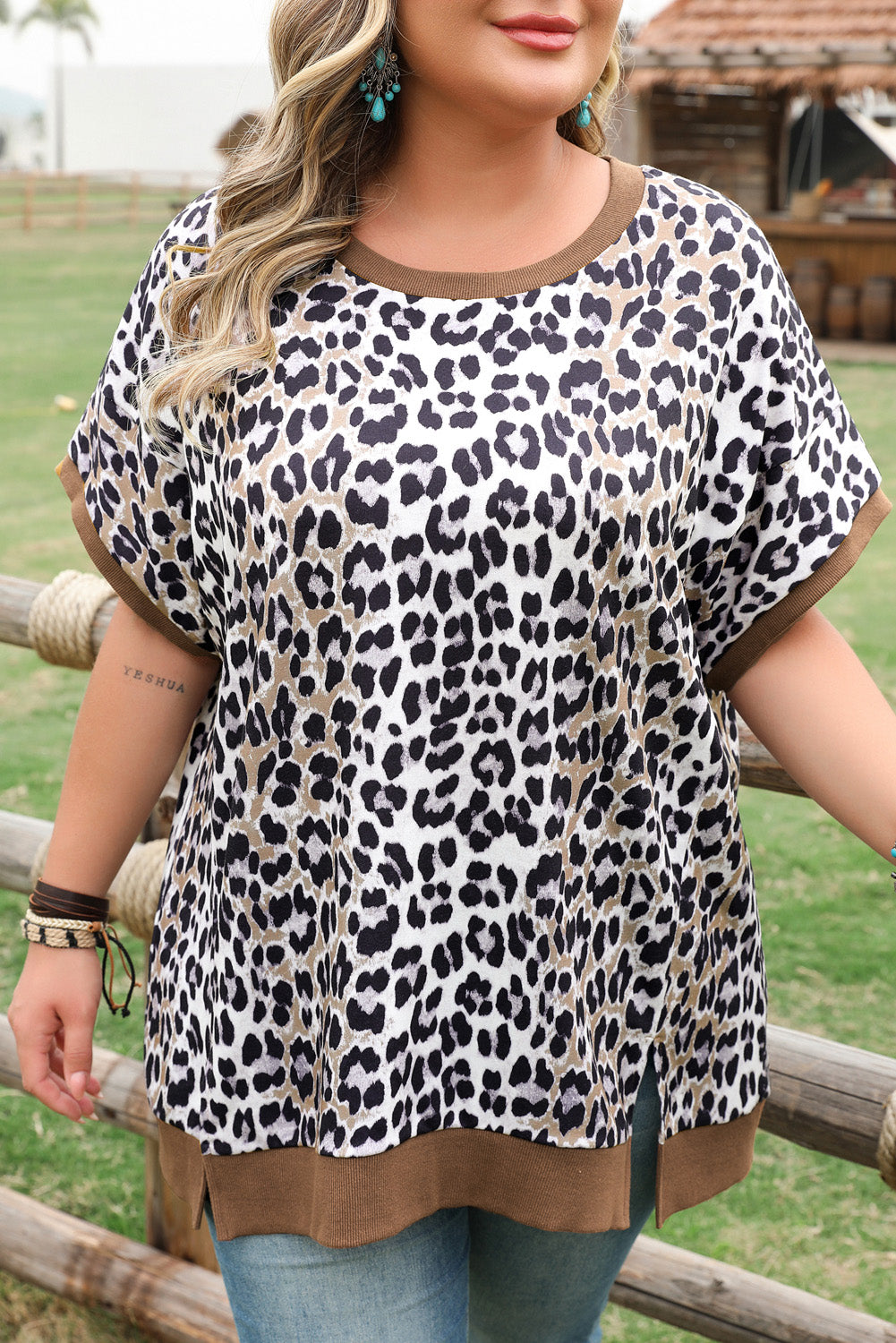 Plus size leopard print top with brown trim on sleeves and hem by kjplussizefashion