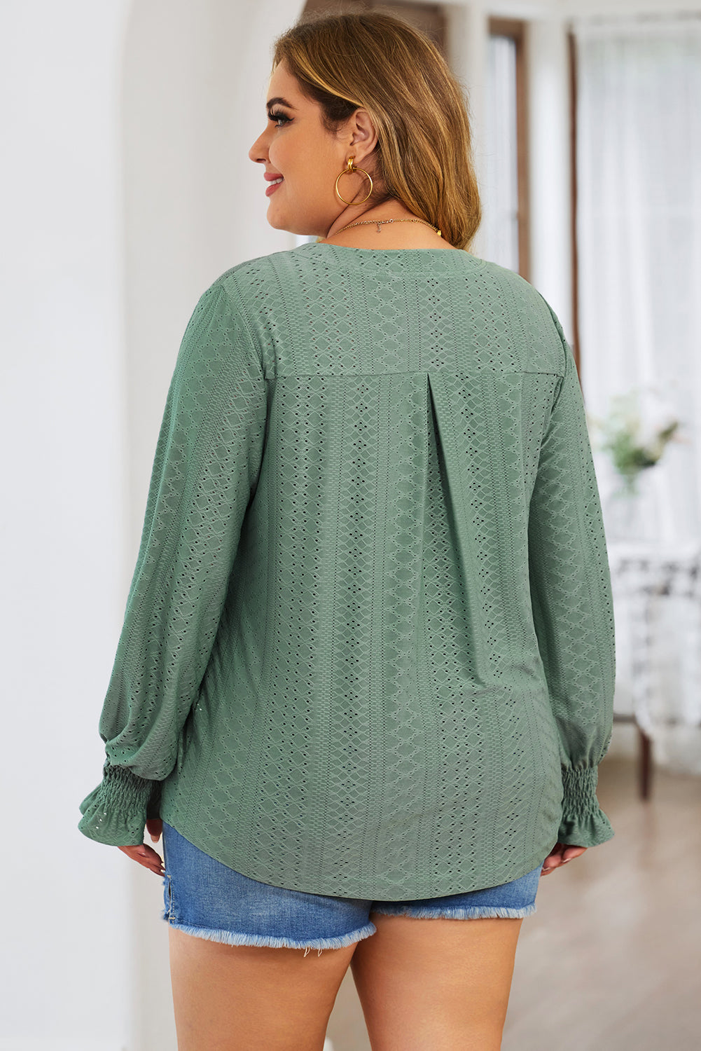 Plus size trendy blouse for women in green with long sleeves and textured pattern by Trendsi