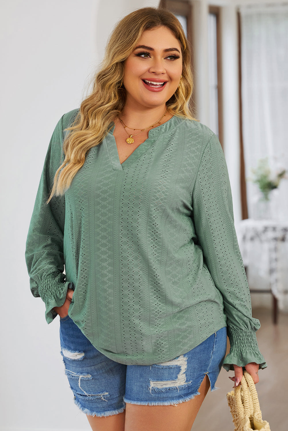 Plus size trendy blouse for women in green with long sleeves and textured pattern from Trendsi
