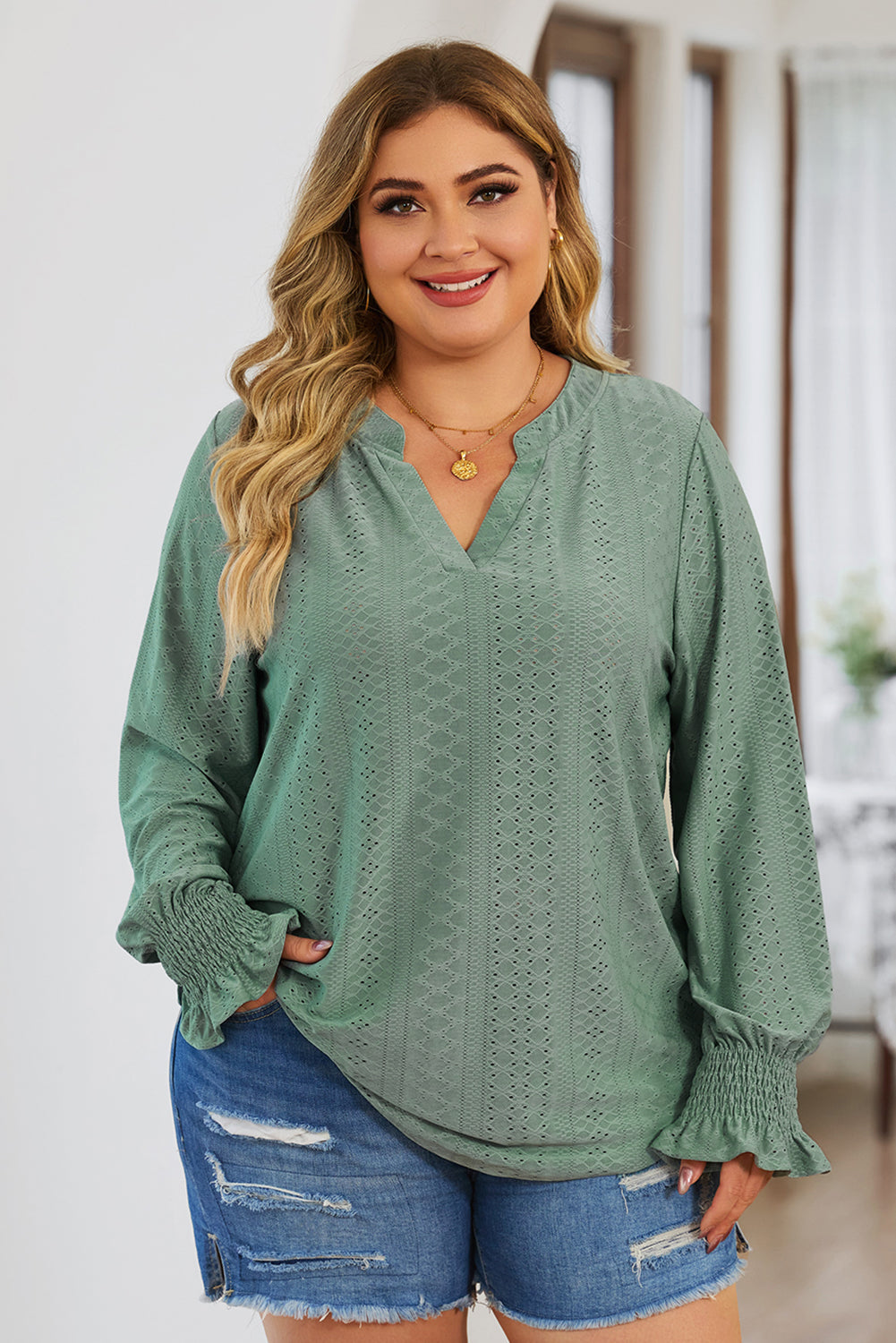 Plus size trendy blouse for women in sage green with long sleeves and textured fabric