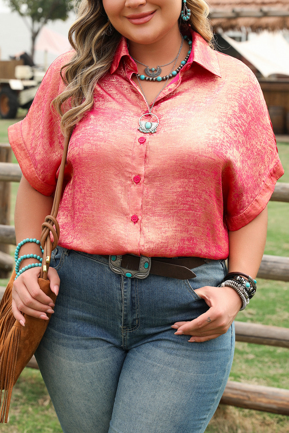 Rose red plus size metallic shirt with short sleeves and button front paired with blue jeans