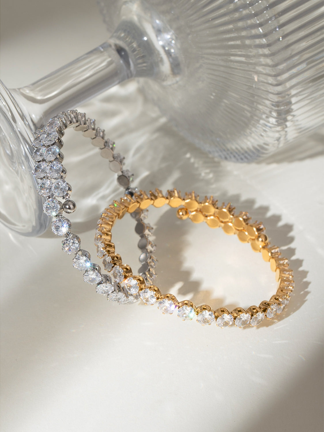 Trendsi stainless steel zircon bracelet in silver and gold finishes shown with sparkling zircon stones