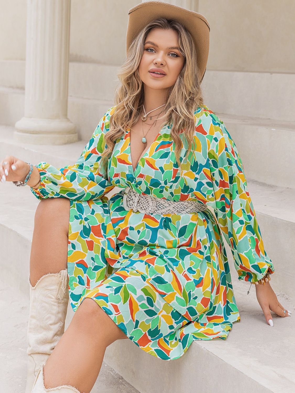 Trendsi surplice long sleeve dress for curvy women with colorful abstract pattern and belted waist