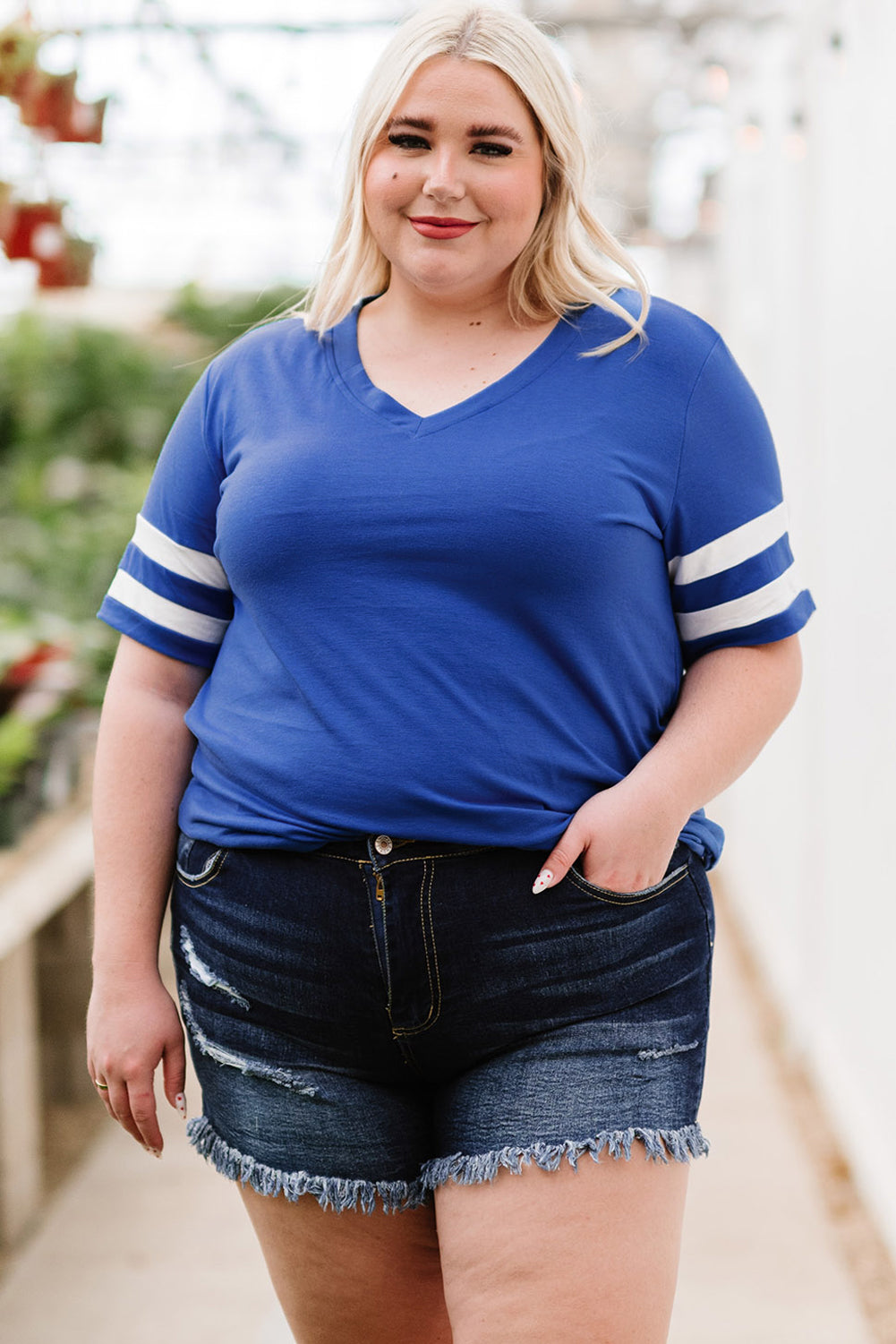 Trendsi women's plus size striped sleeve top in blue with white stripes paired with denim shorts