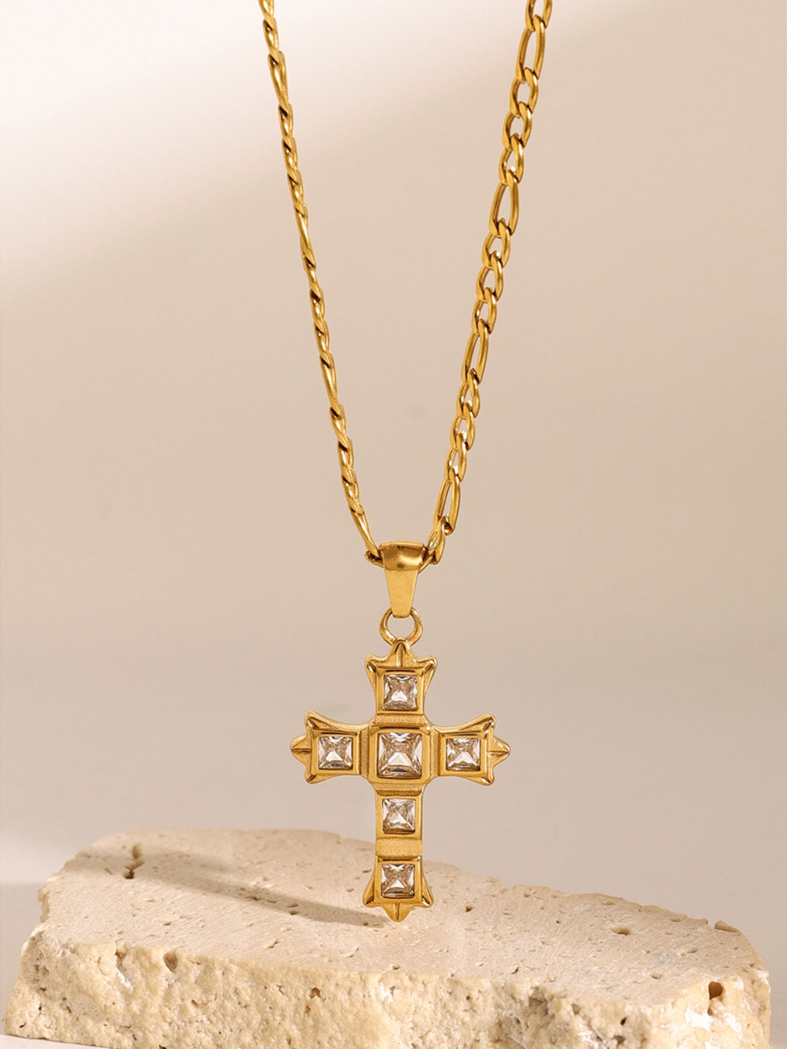 Elegant gold zircon cross pendant for women with square stones on a gold chain necklace
