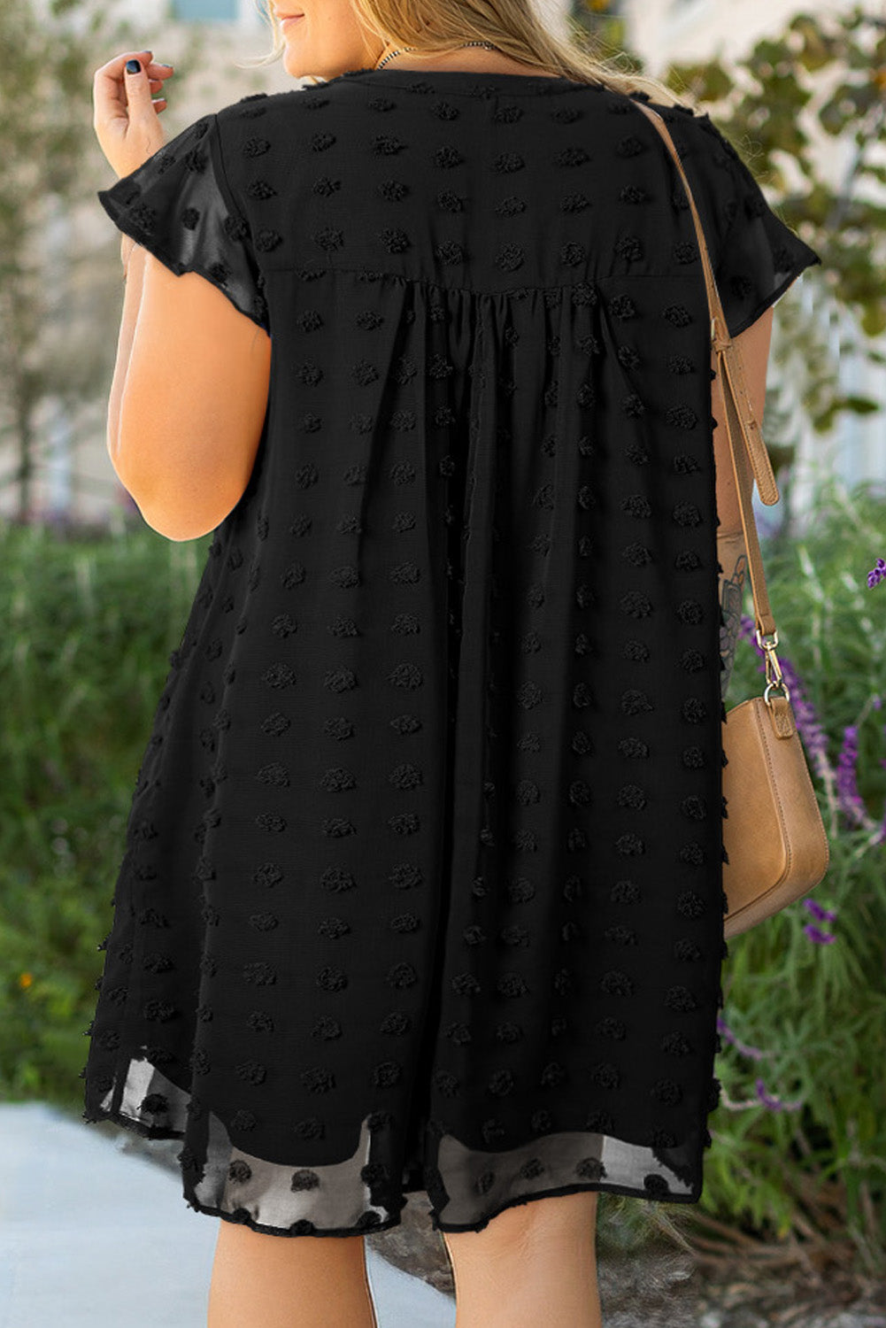 Plus size black textured ruffled summer dress with short sleeves and dotted pattern