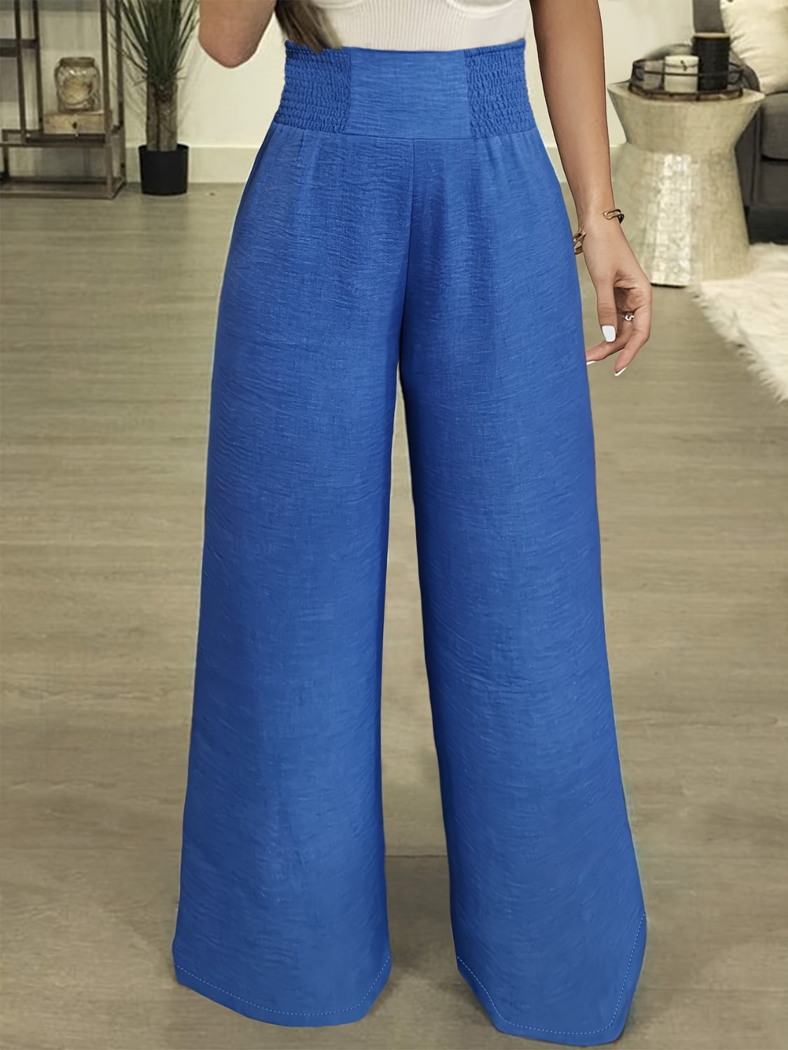 Blue comfortable high waisted pants for women with wide legs and textured fabric