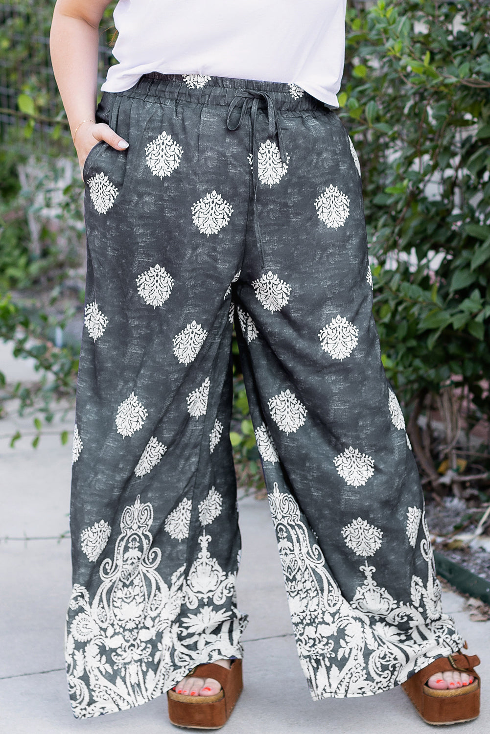 Comfortable plus size lounge pants in black and white with wide legs and drawstring waist