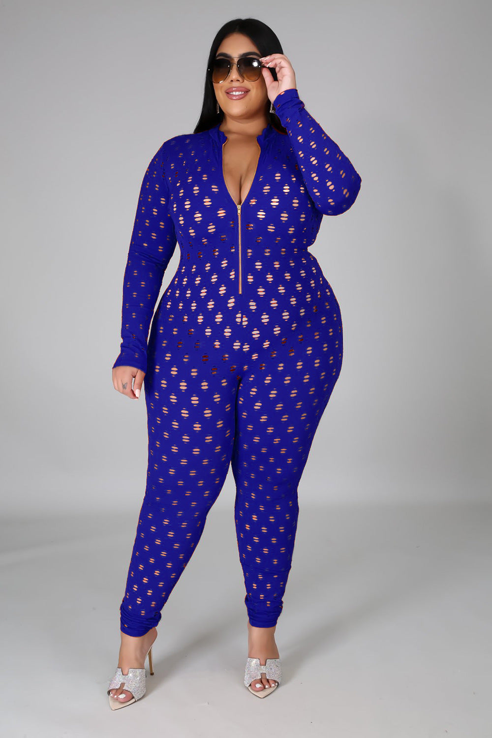 Curvy women zip front jumpsuit in blue with long sleeves and all-over cutout design