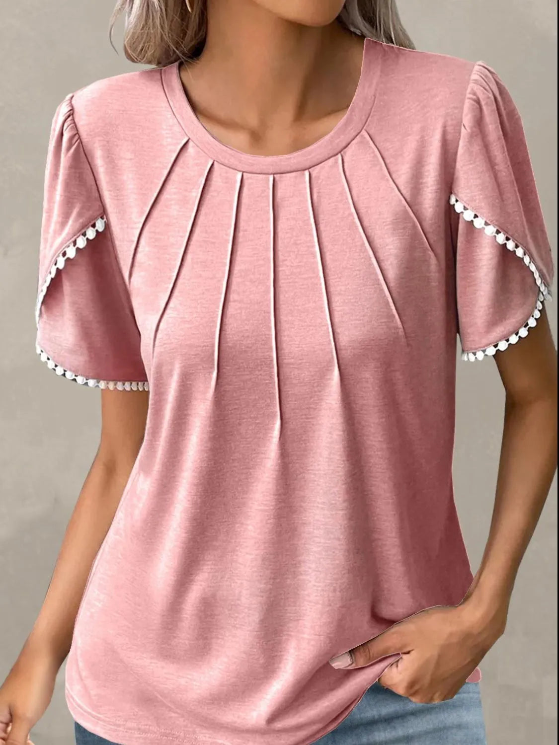 Pink full size round neck top for women with pleated front and decorative trim on sleeves