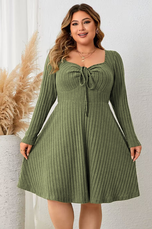 Trendsi long sleeve ribbed plus size dress in olive green with a tie detail and A-line silhouette