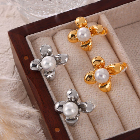 Trendsi synthetic pearl titanium earrings in gold and silver flower design displayed in jewelry box