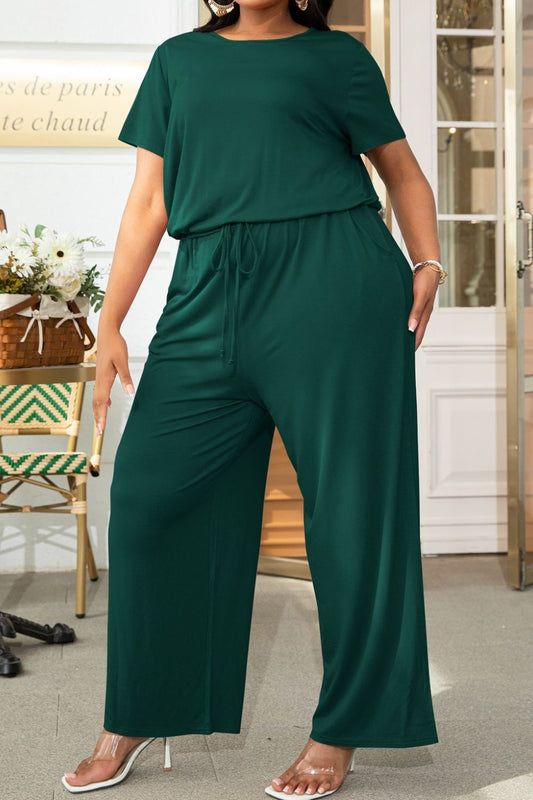 Plus size casual jumpsuit in dark green with short sleeves and drawstring waist by Trendsi