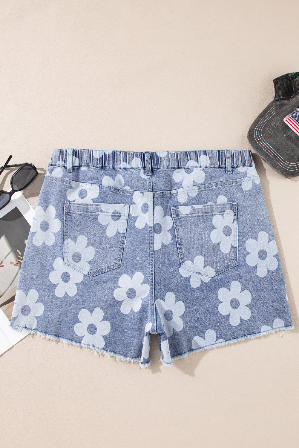 Plus size floral denim shorts with white flower print and elastic waistband by kjplussizefashion
