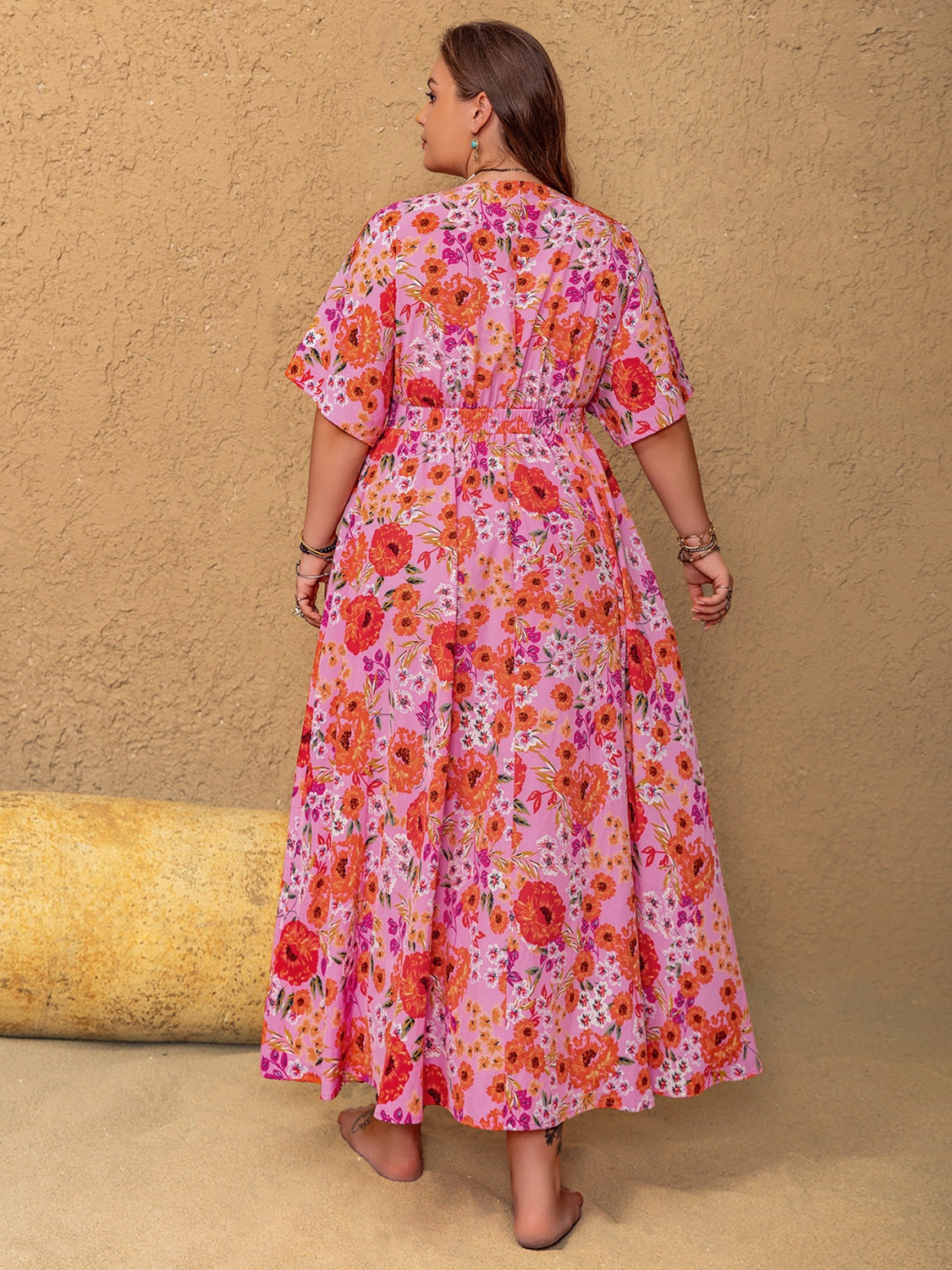 Trendsi plus size floral maxi dress in pink with vibrant red and orange flowers and short sleeves