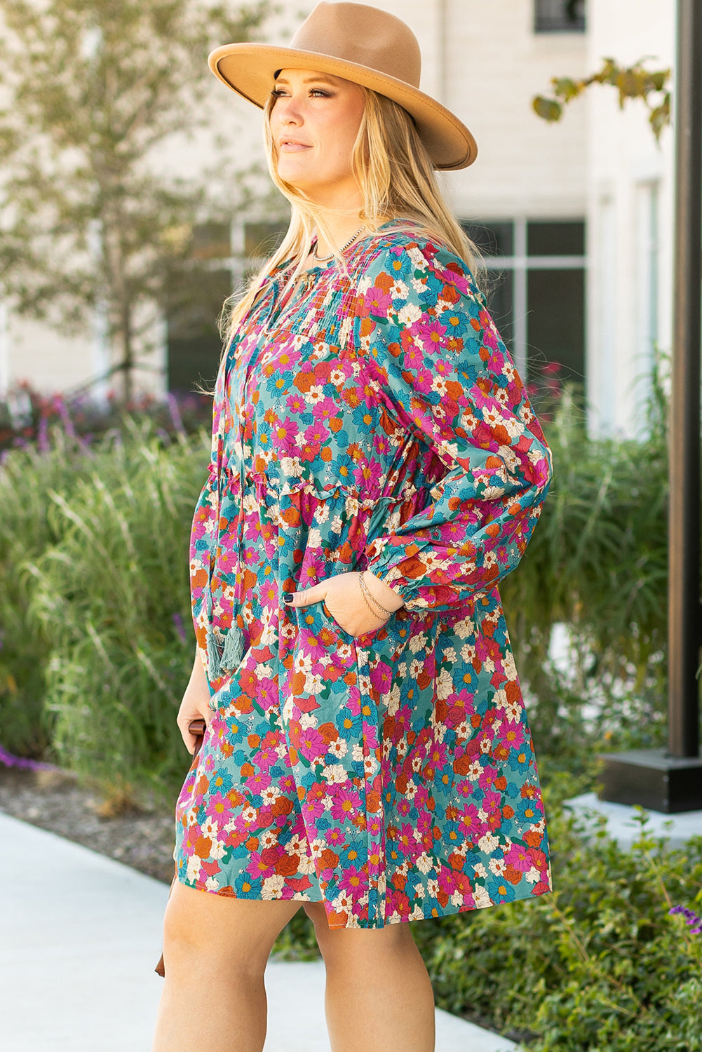 Plus size sky blue floral print shirred ruffle tiered mini dress with long sleeves and relaxed fit