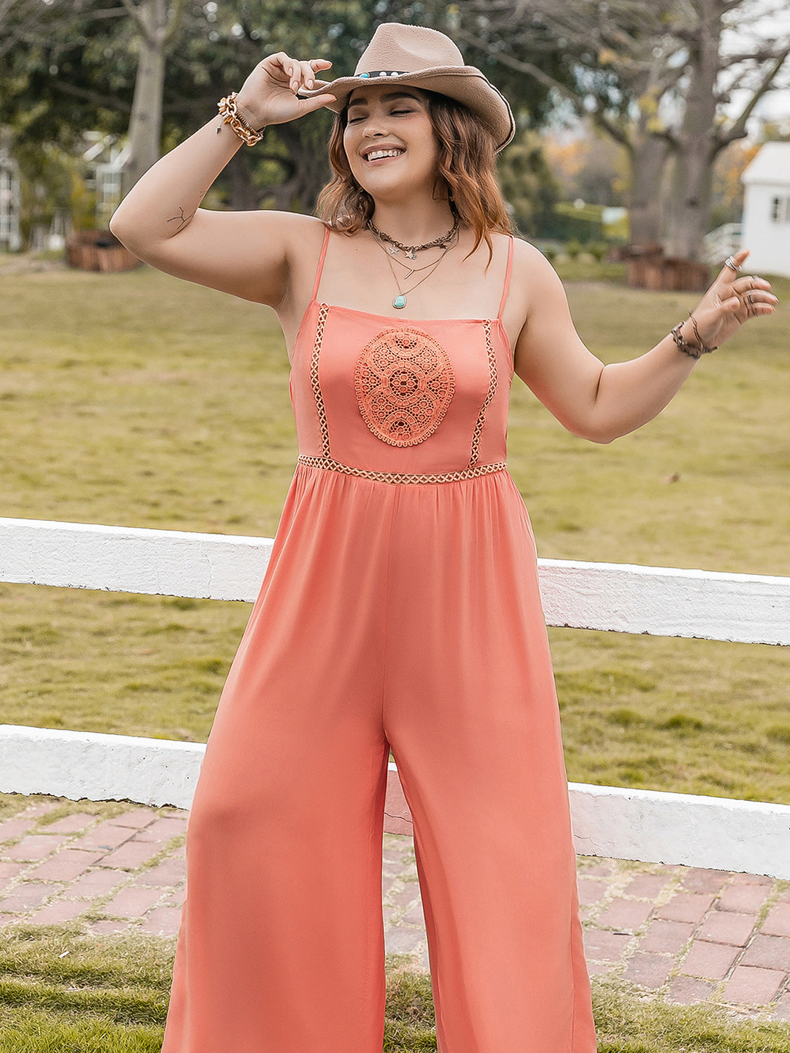 Trendsi plus size lace jumpsuit in coral with spaghetti straps and decorative lace center design