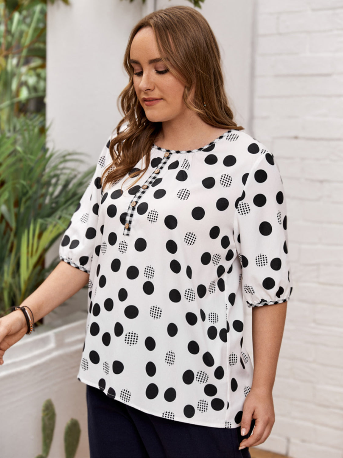 Trendsi plus size polka dot blouse with half sleeves and buttoned neckline in black and white