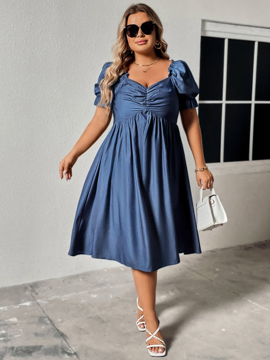 Trendsi plus size ruched sweetheart dress in blue with puff sleeves styled with sunglasses and white sandals