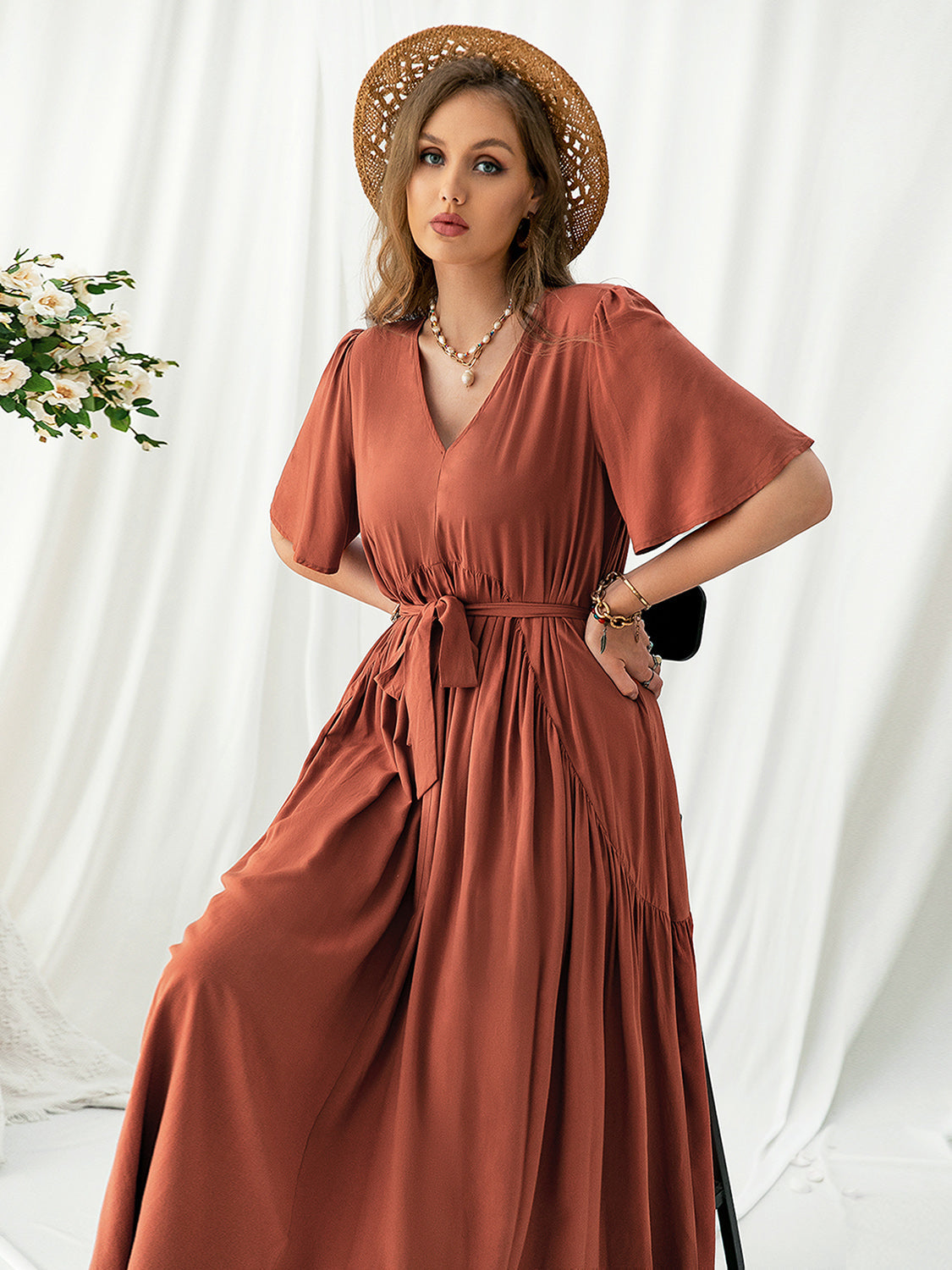 Trendsi plus size v neck midi dress in rust color with short sleeves and waist tie belt