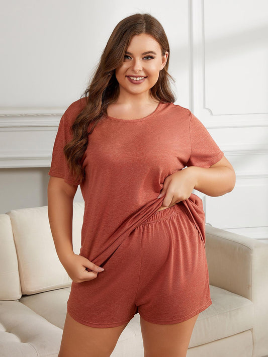  round neck short sleeve plus size pajamas in soft rust color worn by smiling woman