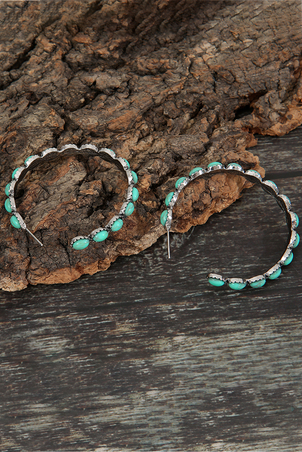 kjplussizefashion sky blue gem hoop earrings with silver setting on rustic wood background