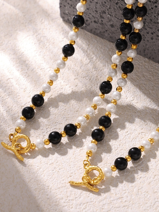 Trendsi black and white beaded stainless steel agate necklace with gold accents and toggle clasp