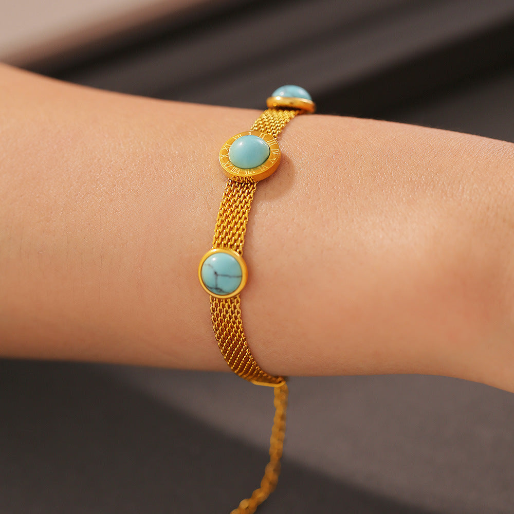 Trendsi turquoise titanium steel bracelet with gold mesh chain and round turquoise stones on wrist