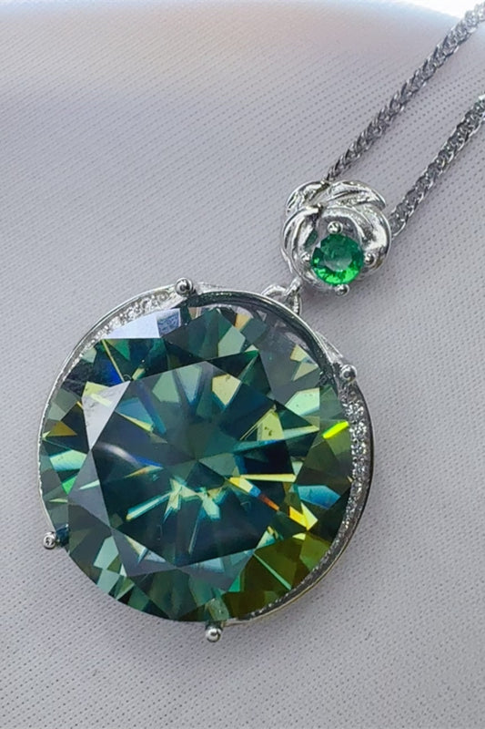 20 carat moissanite pendant necklace with green gemstone and silver chain from Trendsi