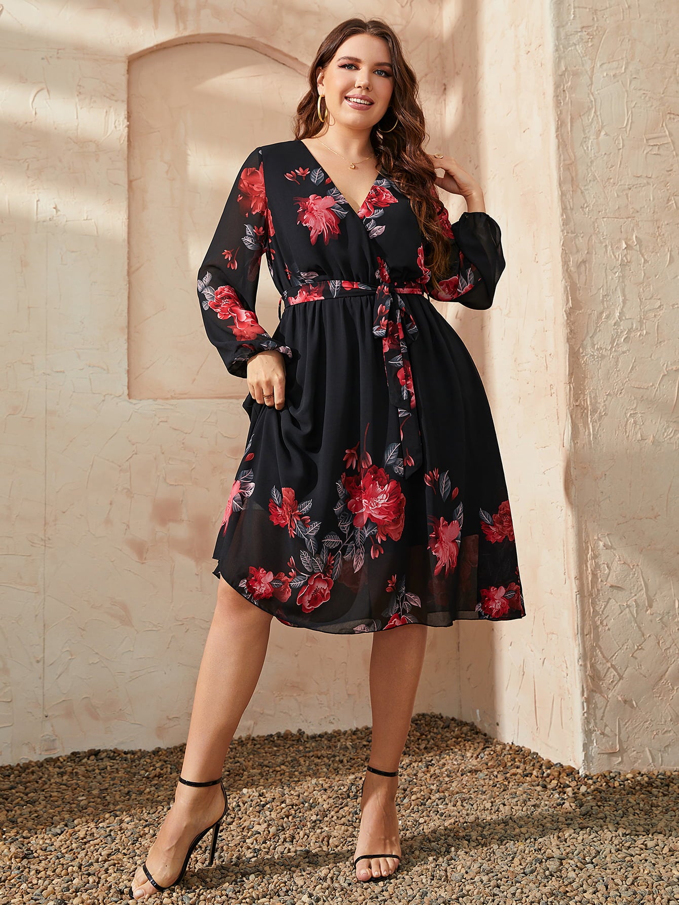  plus size floral dress in black with red flower patterns and long sleeves