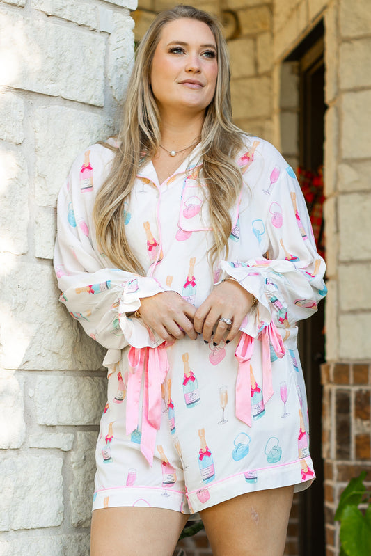 White bow knot sleepwear for curvy women featuring long sleeves and playful bottle print shorts